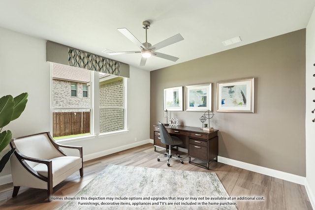 office featuring ceiling fan and light hardwood / wood-style floors