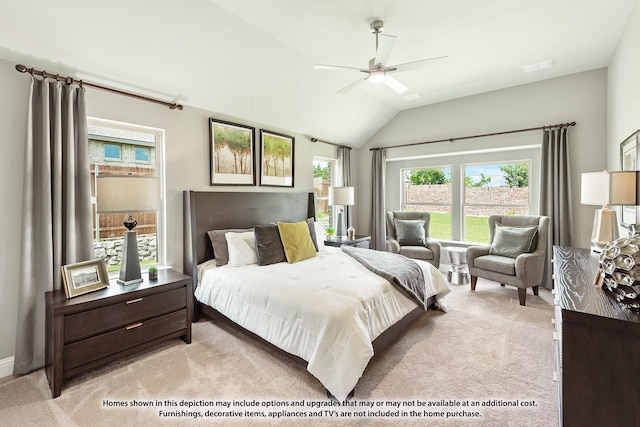 carpeted bedroom featuring vaulted ceiling and ceiling fan