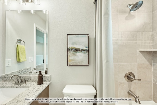 full bathroom with shower / tub combo, vanity, and toilet