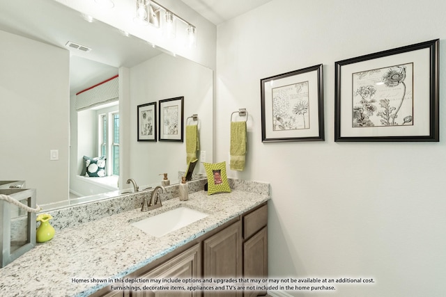 bathroom featuring vanity