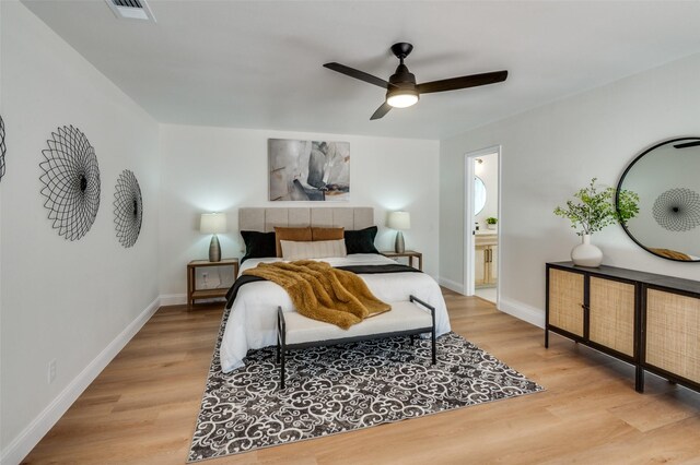 bedroom with ceiling fan and light hardwood / wood-style flooring