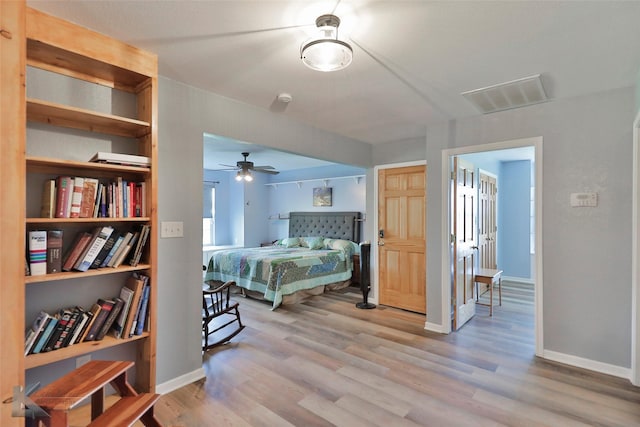 bedroom featuring light hardwood / wood-style floors