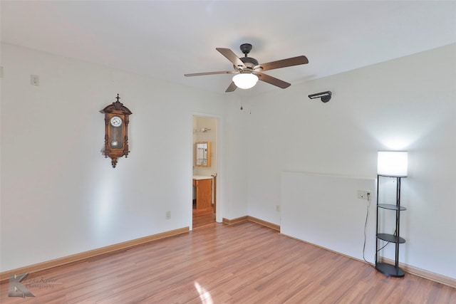 spare room with ceiling fan and light hardwood / wood-style flooring