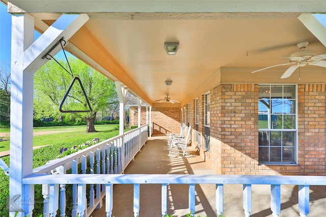 view of patio featuring ceiling fan