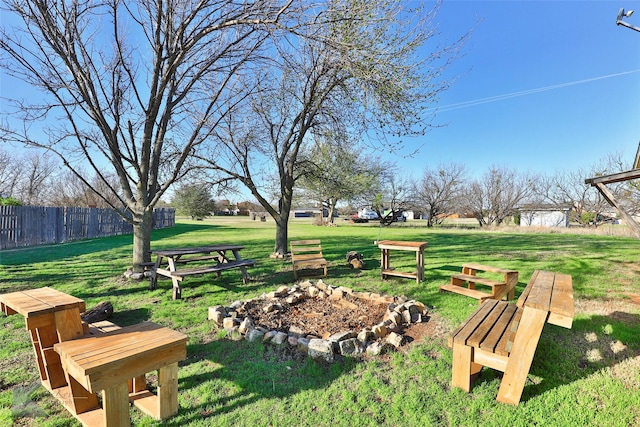 view of property's community with a lawn