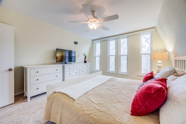 bedroom featuring ceiling fan and light colored carpet