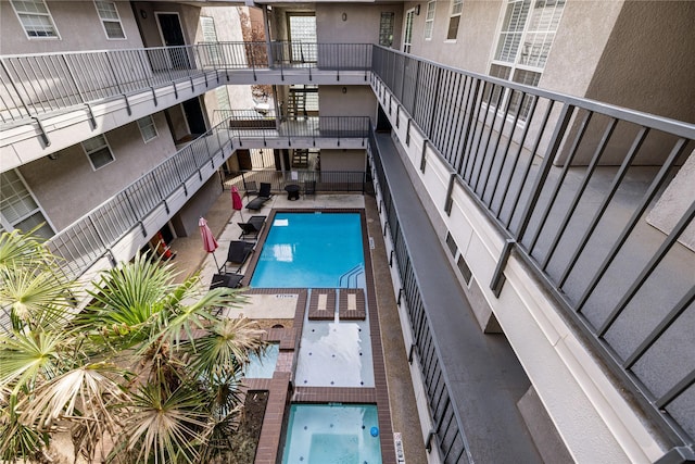 view of swimming pool with a patio area