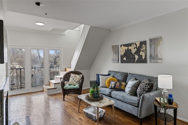 living room featuring hardwood / wood-style floors and ornamental molding