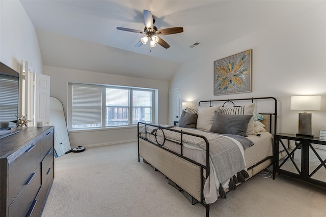 bedroom featuring light colored carpet, ceiling fan, and lofted ceiling