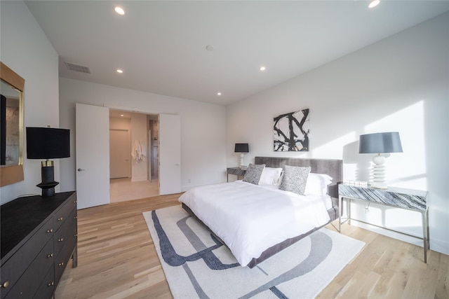 bedroom with light wood-type flooring