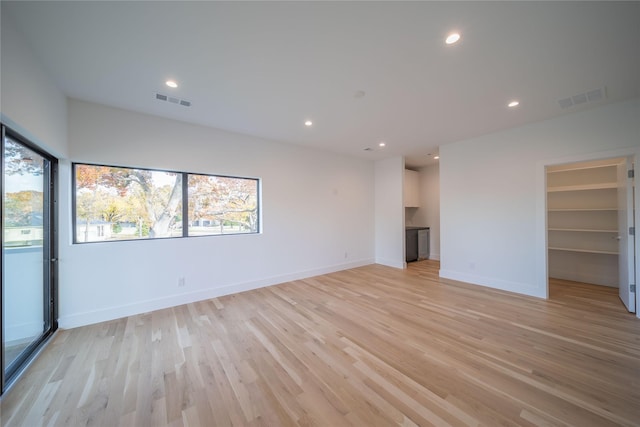 unfurnished living room with light hardwood / wood-style floors