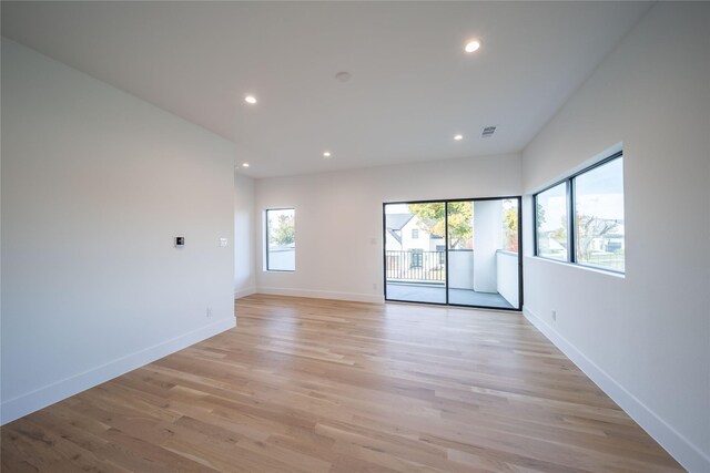 unfurnished room featuring light hardwood / wood-style flooring