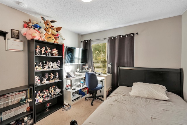 carpeted bedroom featuring a textured ceiling