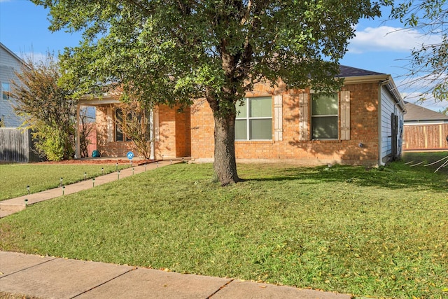 view of front of house with a front lawn