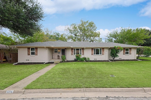 ranch-style home with a front lawn