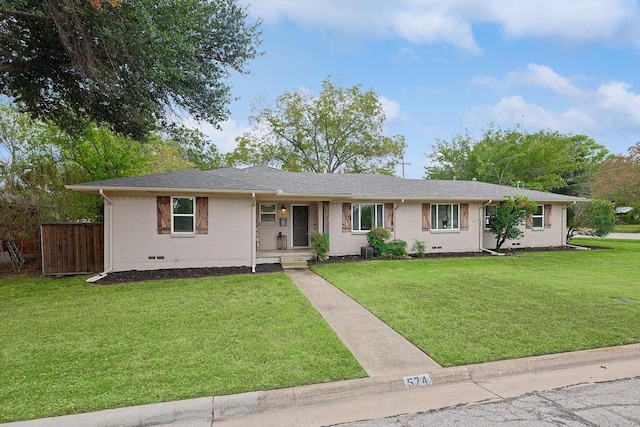 ranch-style home featuring a front lawn