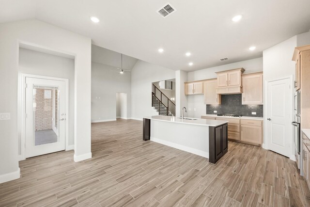 dining space with a wealth of natural light, dark wood-type flooring, and vaulted ceiling