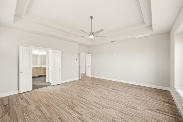 bedroom featuring carpet flooring and connected bathroom