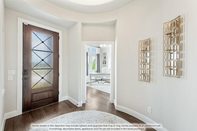 entryway with dark hardwood / wood-style floors