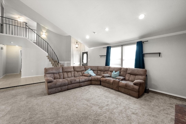 carpeted living room with crown molding and high vaulted ceiling