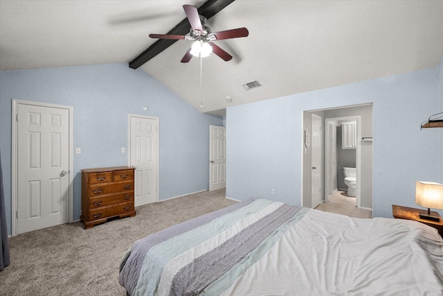 carpeted bedroom featuring ceiling fan, ensuite bathroom, and lofted ceiling with beams