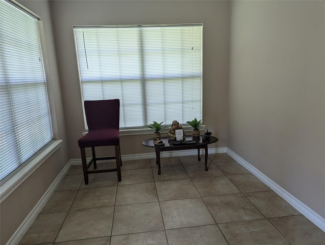 living area featuring light tile patterned floors