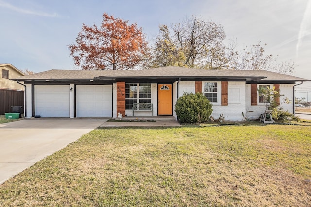 ranch-style home featuring a front yard and a garage