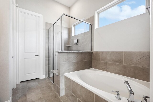 727 Waterbrook Pkwy, Argyle, TX 76226 - full bath featuring tile patterned flooring, a shower stall, and a bath