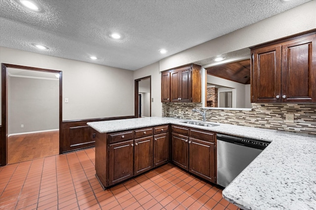 kitchen with kitchen peninsula, backsplash, stainless steel dishwasher, and sink