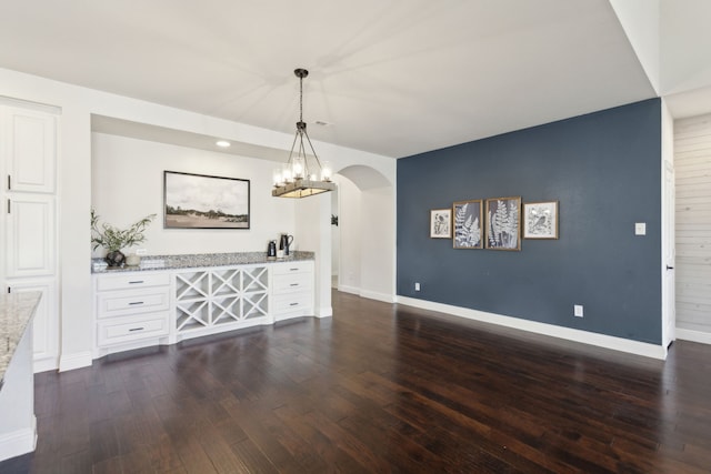 dining area with dark wood-type flooring