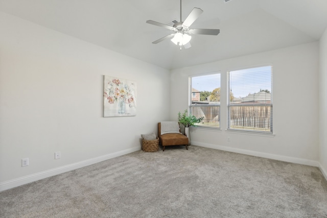 unfurnished room featuring light carpet, ceiling fan, and lofted ceiling