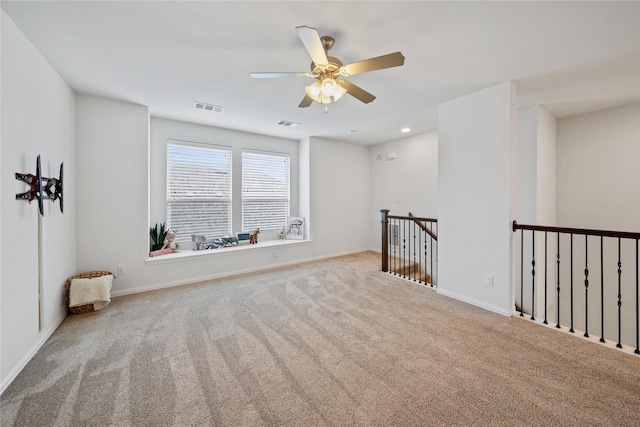 spare room with light carpet, baseboards, visible vents, ceiling fan, and recessed lighting