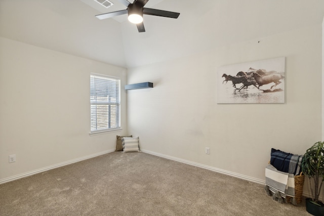 unfurnished room with light colored carpet and ceiling fan