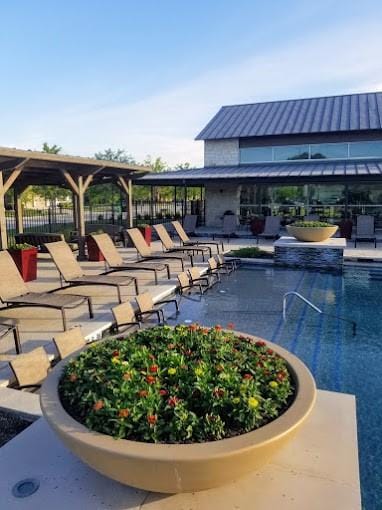 view of pool featuring a patio area