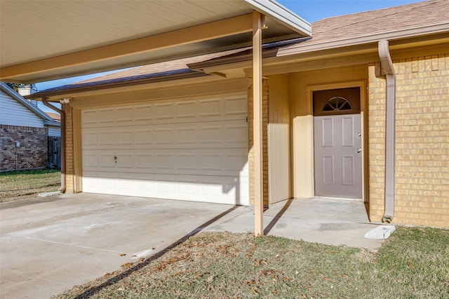 entrance to property featuring a garage