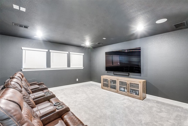 carpeted living room featuring a textured ceiling