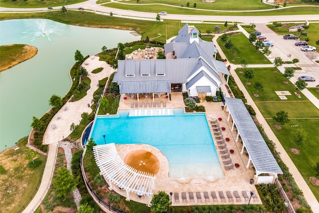 birds eye view of property featuring a water view