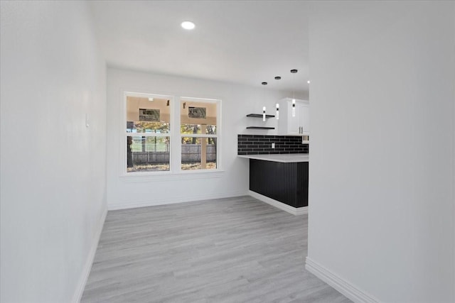 interior space with light hardwood / wood-style flooring