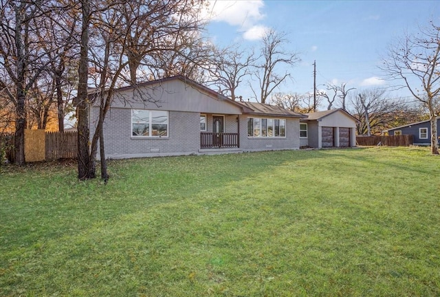 back of property featuring a lawn