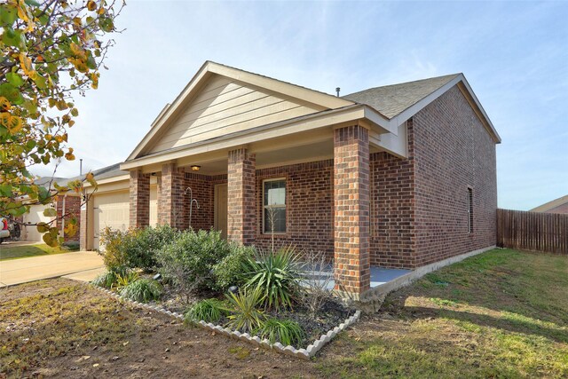 view of front of property with a garage