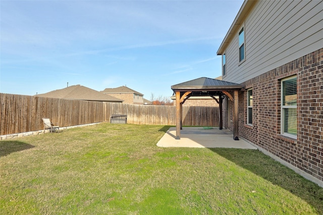 view of yard with a gazebo and a patio