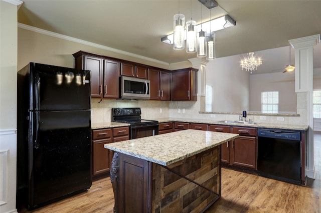 kitchen with dark brown cabinetry, sink, light hardwood / wood-style flooring, and black appliances