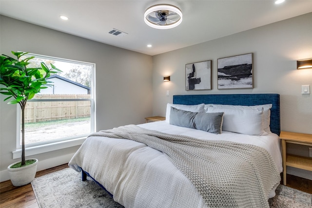 bedroom featuring wood-type flooring