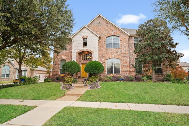 view of front of home featuring a front lawn