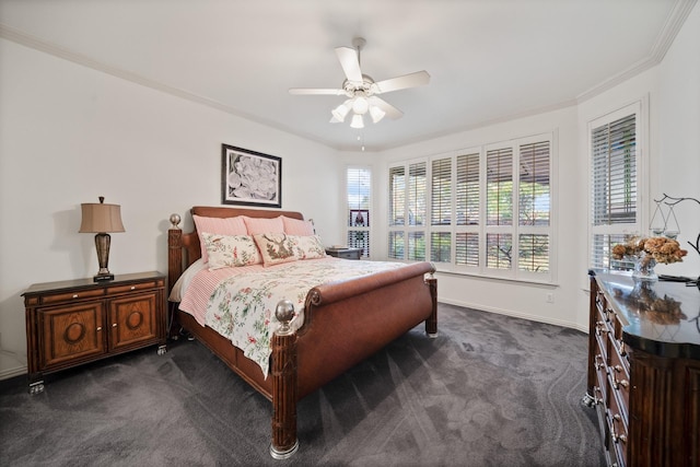 bedroom featuring ceiling fan, dark carpet, and crown molding