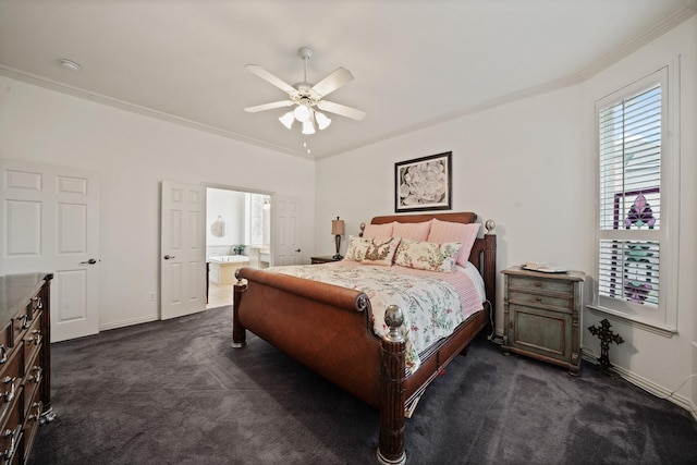 bedroom featuring ensuite bath, ceiling fan, crown molding, and dark carpet