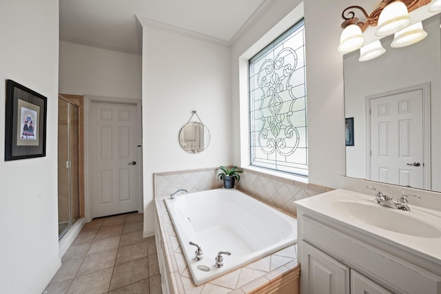 bathroom featuring tile patterned flooring, vanity, a wealth of natural light, and ornamental molding