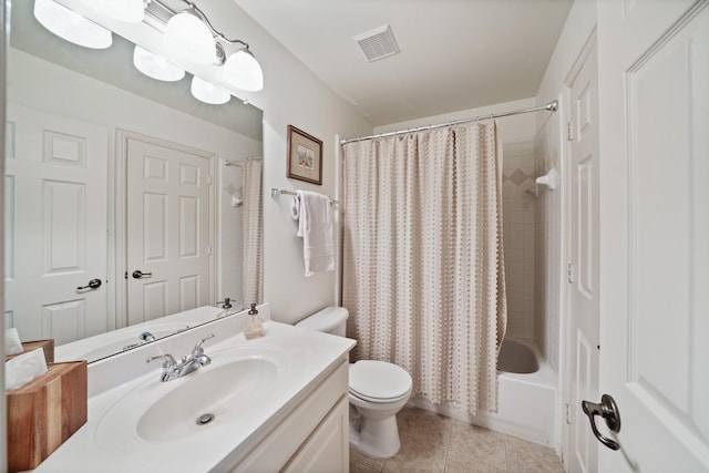 full bathroom featuring tile patterned floors, vanity, shower / bathtub combination with curtain, and toilet