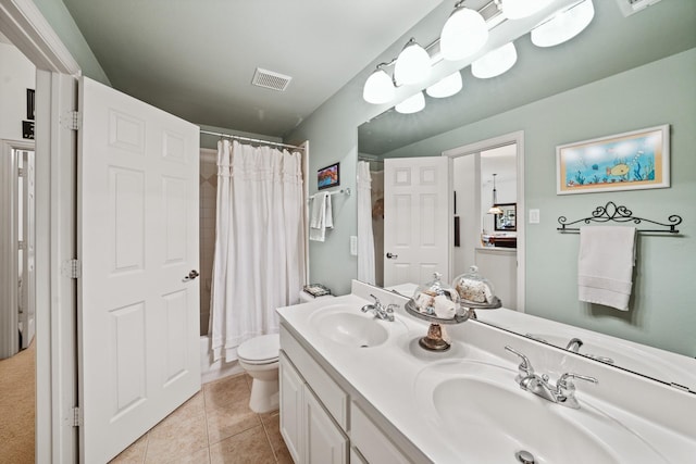 full bathroom with shower / bathtub combination with curtain, tile patterned flooring, vanity, and toilet