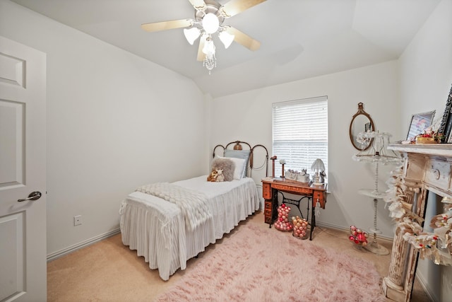 bedroom with ceiling fan, light carpet, and lofted ceiling